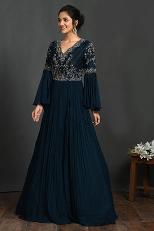 Shop stunning teal blue embroidered fit and flare gown online in USA  Make a fashion statement on festive occasions and weddings with designer suits, Indian dresses, Anarkali suits, palazzo suits, designer gowns, sharara suits from Pure Elegance Indian fashion store in USA.-left