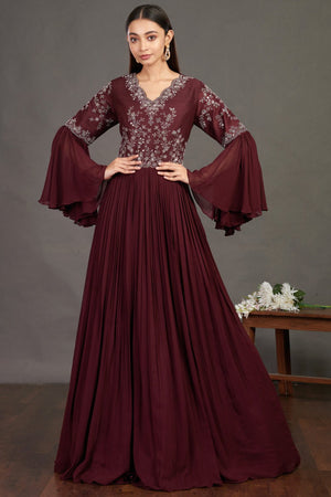 Shop stunning wine embroidered fit and flare gown online in USA  Make a fashion statement on festive occasions and weddings with designer suits, Indian dresses, Anarkali suits, palazzo suits, designer gowns, sharara suits from Pure Elegance Indian fashion store in USA.-front