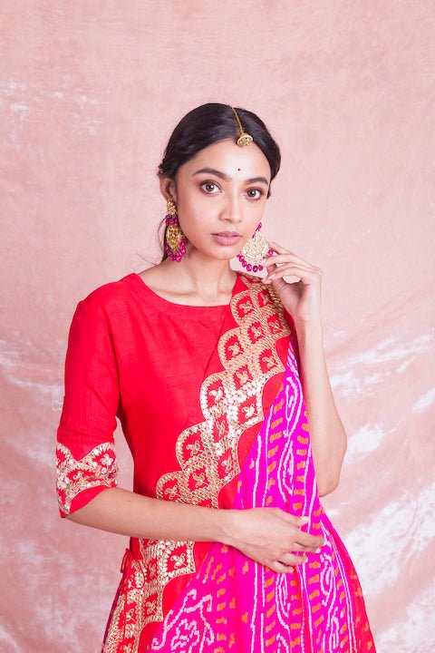 Buy beautiful red Mysore silk designer suit online in USA with pink draped Bandhej dupatta. Champion ethnic fashion on weddings and festivals with a stunning collection of designer Indian dresses, Indowestern outfits, salwar suits, Anarkali suits from Pure Elegance Indian fashion store in USA.-closeup