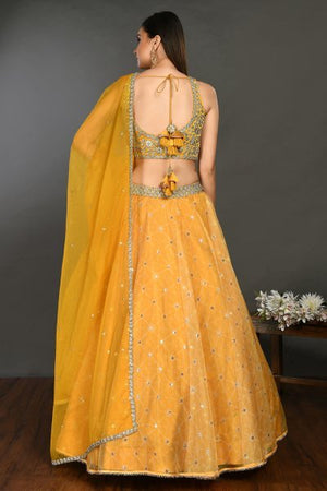 Buy stunning yellow organza lehenga online in USA with dupatta. Get festive ready in beautiful designer Anarkali suits, designer lehenga, wedding gowns, sharara suits, designer sarees from Pure Elegance Indian fashion store in USA.-back