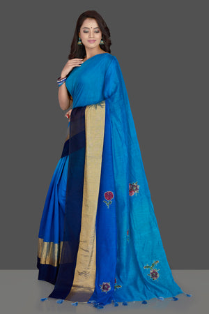 Shop charming blue floral applique linen sari online in USA with powder blue floral saree blouse. Radiate elegance with designer sarees with blouse, linen sarees from Pure Elegance Indian fashion boutique in USA. We bring a especially curated collection of ethnic saris for Indian women in USA under one roof!-pallu