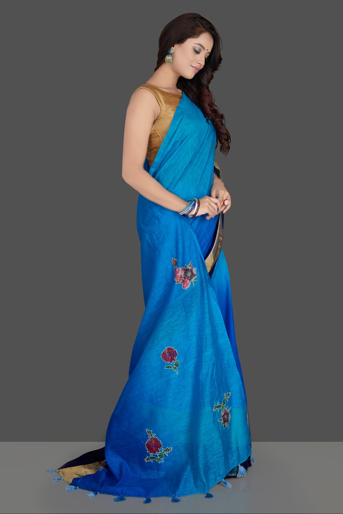 Shop charming blue floral applique linen sari online in USA with powder blue floral saree blouse. Radiate elegance with designer sarees with blouse, linen sarees from Pure Elegance Indian fashion boutique in USA. We bring a especially curated collection of ethnic saris for Indian women in USA under one roof!-side