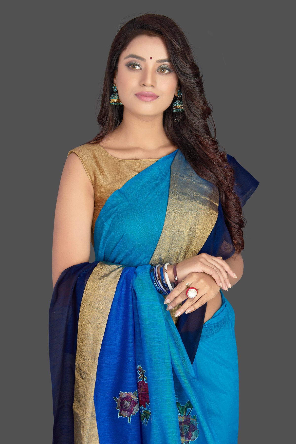 Shop charming blue floral applique linen sari online in USA with powder blue floral saree blouse. Radiate elegance with designer sarees with blouse, linen sarees from Pure Elegance Indian fashion boutique in USA. We bring a especially curated collection of ethnic saris for Indian women in USA under one roof!-closeup