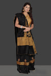 Shop beautiful black applique work raw silk saree online in USA with cream applique work sari blouse. Radiate elegance with embroidered sarees with blouse, raw silk sarees from Pure Elegance Indian fashion boutique in USA. We bring a especially curated collection of ethnic saris for Indian women in USA under one roof!-full view