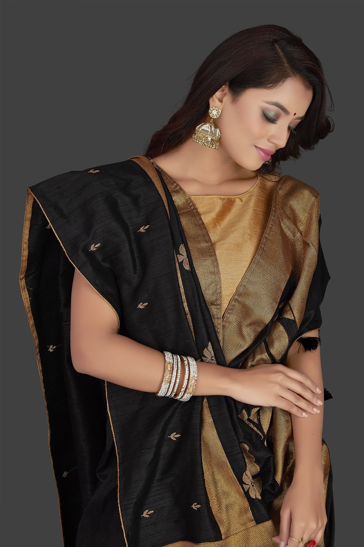 Shop beautiful black applique work raw silk saree online in USA with cream applique work sari blouse. Radiate elegance with embroidered sarees with blouse, raw silk sarees from Pure Elegance Indian fashion boutique in USA. We bring a especially curated collection of ethnic saris for Indian women in USA under one roof!-closeup
