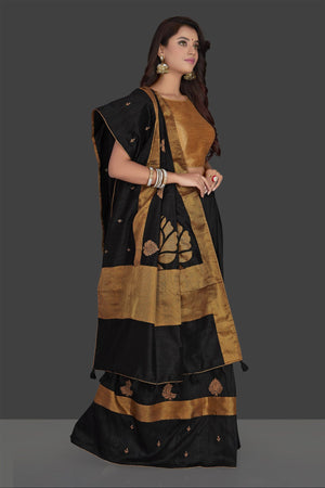 Shop beautiful black applique work raw silk saree online in USA with cream applique work sari blouse. Radiate elegance with embroidered sarees with blouse, raw silk sarees from Pure Elegance Indian fashion boutique in USA. We bring a especially curated collection of ethnic saris for Indian women in USA under one roof!-side