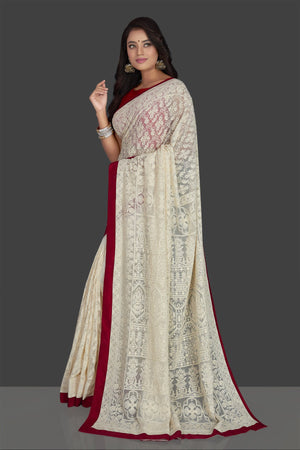 Buy elegant off-white embroidered georgette saree online in USA with saree blouse. Radiate elegance with embroidered sarees with blouse, georgette sarees from Pure Elegance Indian fashion boutique in USA. We bring a especially curated collection of ethnic saris for Indian women in USA under one roof!-pallu
