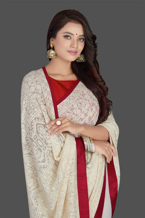 Buy elegant off-white embroidered georgette saree online in USA with saree blouse. Radiate elegance with embroidered sarees with blouse, georgette sarees from Pure Elegance Indian fashion boutique in USA. We bring a especially curated collection of ethnic saris for Indian women in USA under one roof!-closeup
