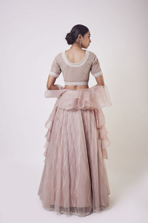 Shop stunning peach organza lehenga online in USA with ruffle dupatta. Get festive ready in beautiful designer Anarkali suits, designer lehenga, wedding gowns, sharara suits, designer sarees from Pure Elegance Indian fashion store in USA.-back