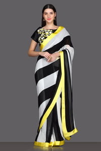 Shop elegant black and white striped saree online in USA with embroidered saree blouse. Make a fashion statement at parties with stunning designer sarees from Pure Elegance Indian fashion store in USA.-full view