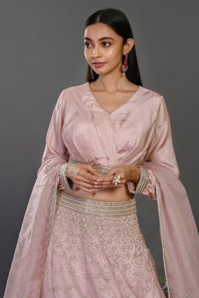Buy beautiful pink organza lehenga online in USA with dupatta. Shop beautiful designer lehengas, wedding lehengas, Indian dresses, designer suits for special occasions from Pure Elegance Indian clothing store in USA.-closeup