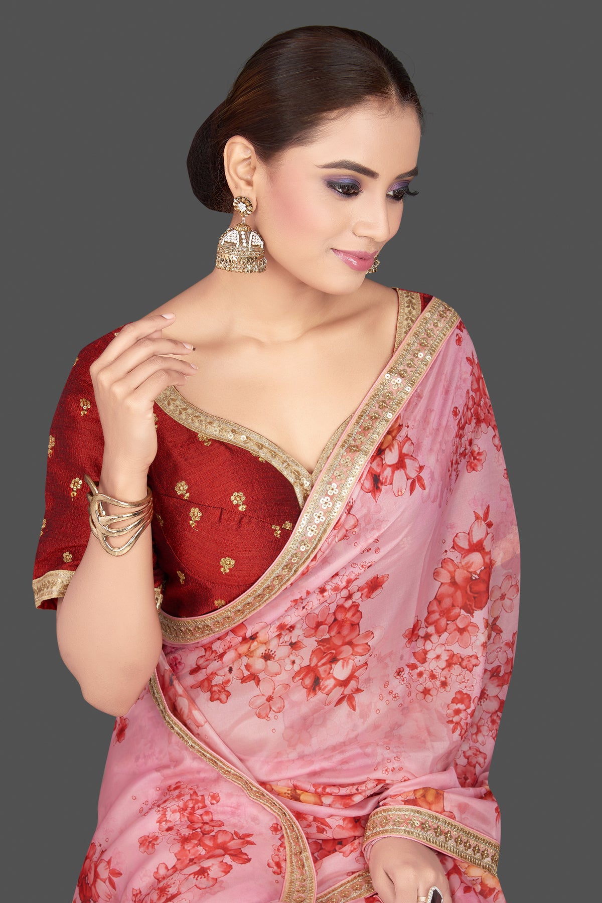 Shop beautiful pink embroidered floral organza saree saree online in USA with red saree blouse. Look glamorous at parties and weddings in stunning designer sarees, embroidered sareees, fancy sarees, Bollywood sarees from Pure Elegance Indian saree store in USA.-closeup