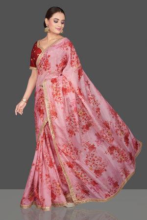 Shop beautiful pink embroidered floral organza saree saree online in USA with red saree blouse. Look glamorous at parties and weddings in stunning designer sarees, embroidered sareees, fancy sarees, Bollywood sarees from Pure Elegance Indian saree store in USA.-pallu