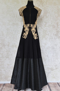 Buy this ethnic Indian black and golden dress online or from our Pure Elegance store in USA. The Bollywood-inspired dress is ideal for any wedding or reception. Front View.