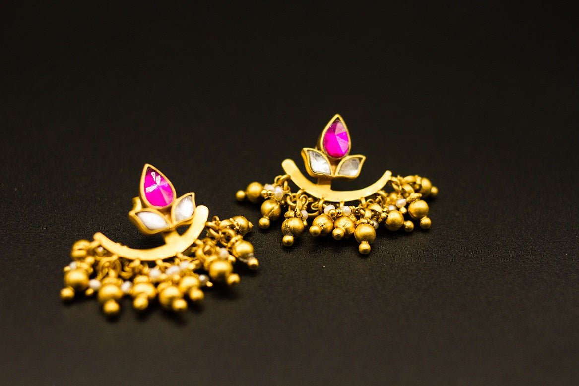 Buy Amrapali silver gold plated glass earrings online in USA with golden beads. Raise your ethnic style quotient on special occasions with exquisite Indian jewelry from Pure Elegance Indian clothing store in USA. Enhance your Indian look with silver gold plated jewelry, necklaces, fashion jewelry available online.-closeup