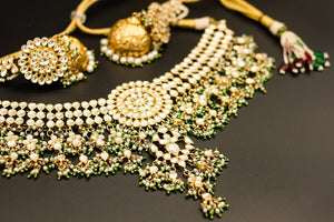 Shop silver gold plated kundan Amrapali necklace set online in USA with jhumki. Raise your ethnic style quotient on special occasions with exquisite Indian jewelry from Pure Elegance Indian clothing store in USA. Enhance your Indian look with silver gold plated jewelry, necklaces, silver jewelry available online.-side