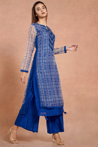 Shop stunning cobalt blue muslin kurta set online in USA with palazzo. Make a fashion statement on festive occasions and weddings with palazzo suits, sharara suits, partywear dresses, salwar suits from Pure Elegance Indian fashion store in USA.-full view