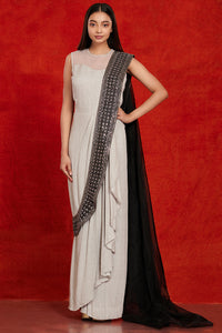 Buy stunning grey and black embellished saree gown online in USA. Make a fashion statement on festive occasions and weddings with palazzo suits, sharara suits, partywear dresses, salwar suits from Pure Elegance Indian fashion store in USA.-full view