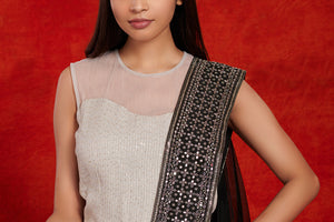 Buy stunning grey and black embellished saree gown online in USA. Make a fashion statement on festive occasions and weddings with palazzo suits, sharara suits, partywear dresses, salwar suits from Pure Elegance Indian fashion store in USA.-neckline