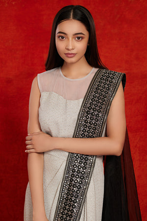 Buy stunning grey and black embellished saree gown online in USA. Make a fashion statement on festive occasions and weddings with palazzo suits, sharara suits, partywear dresses, salwar suits from Pure Elegance Indian fashion store in USA.-closeup