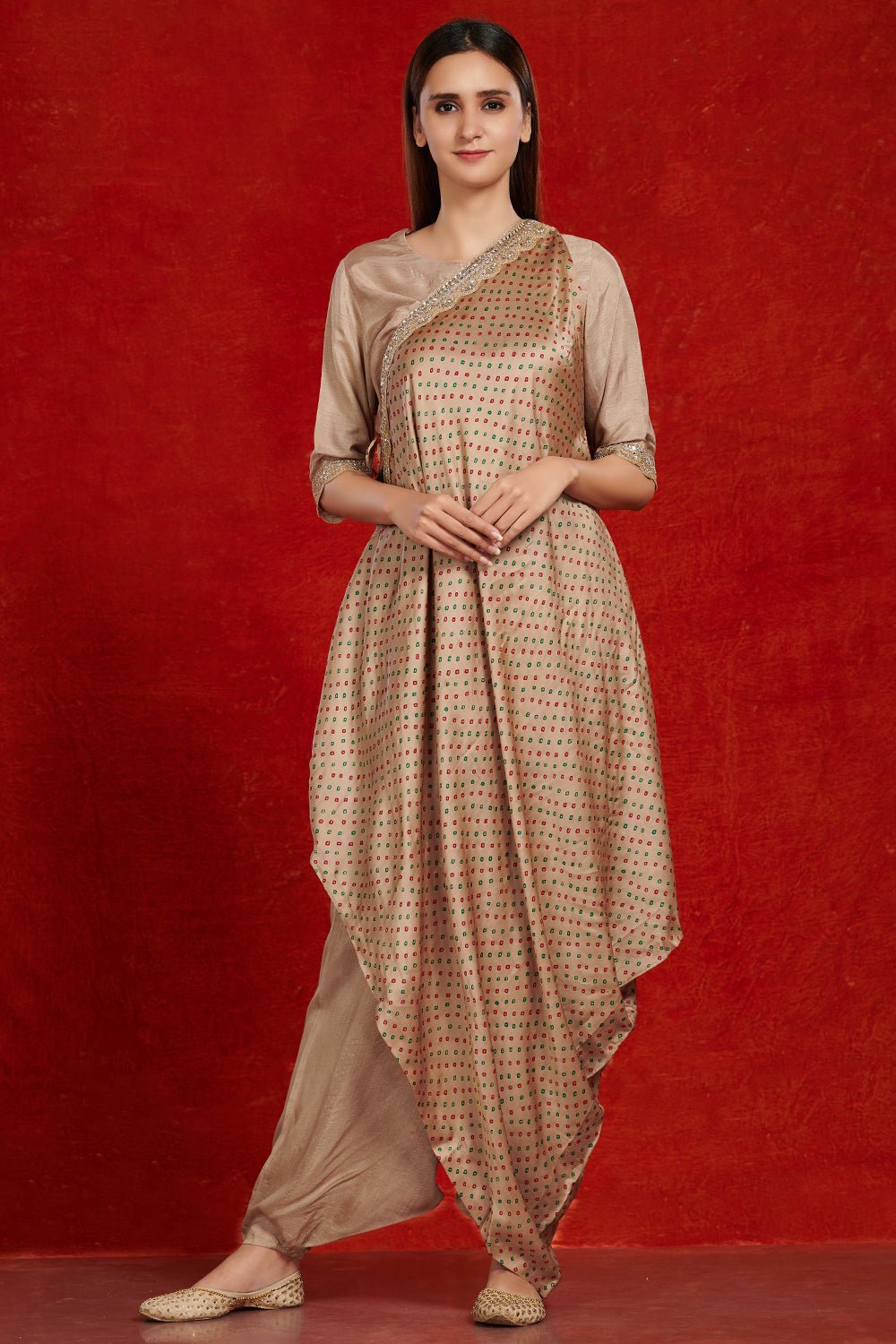 Shop stunning beige printed jumpsuit online in USA with printed drape. Make a fashion statement on festive occasions and weddings with palazzo suits, sharara suits, partywear dresses, salwar suits from Pure Elegance Indian fashion store in USA.-full view