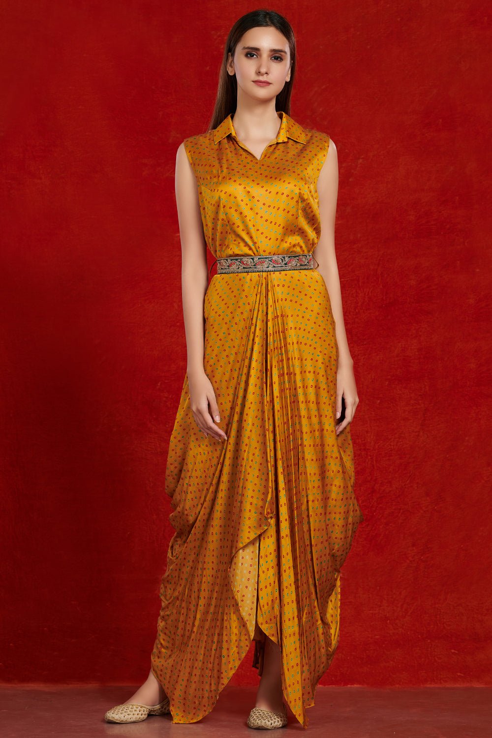 Buy beautiful mustard bandhej print jumpsuit online in USA with embroidered belt. Make a fashion statement on festive occasions and weddings with designer suits, Indian dresses, Anarkali suits, palazzo suits, designer gowns, sharara suits from Pure Elegance Indian fashion store in USA.-full view