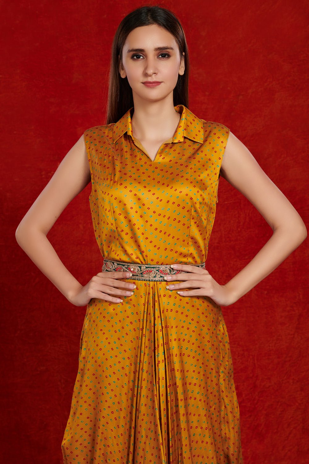 Buy beautiful mustard bandhej print jumpsuit online in USA with embroidered belt. Make a fashion statement on festive occasions and weddings with designer suits, Indian dresses, Anarkali suits, palazzo suits, designer gowns, sharara suits from Pure Elegance Indian fashion store in USA.-closeup