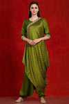 Shop stunning mehendi green silk jumpsuit online in USA with printed attached drape. Make a fashion statement on festive occasions and weddings with designer suits, Indian dresses, Anarkali suits, palazzo suits, designer gowns, sharara suits from Pure Elegance Indian fashion store in USA.-full view