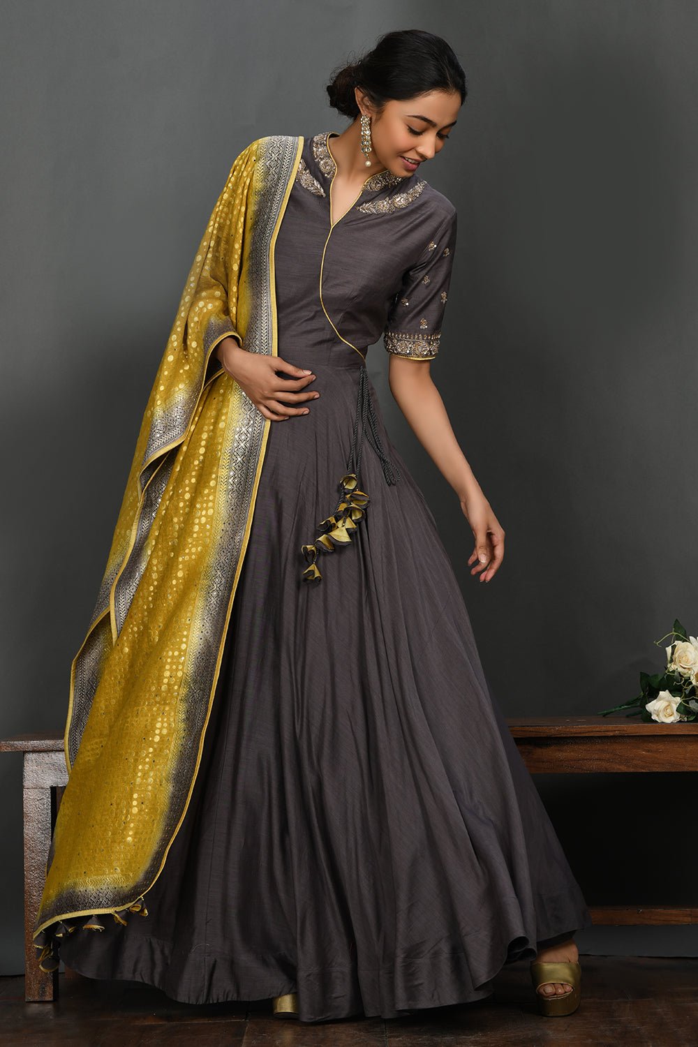 Buy stunning grey embroidered floorlength Anarkali online in USA with mustard dupatta. Make a fashion statement on festive occasions and weddings with palazzo suits, sharara suits, partywear dresses, salwar suits from Pure Elegance Indian fashion store in USA.-front
