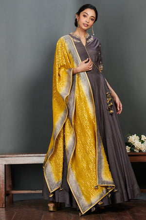 Buy stunning grey embroidered floorlength Anarkali online in USA with mustard dupatta. Make a fashion statement on festive occasions and weddings with palazzo suits, sharara suits, partywear dresses, salwar suits from Pure Elegance Indian fashion store in USA.-dupatta