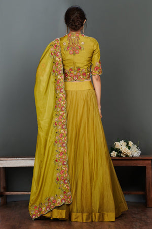 Buy beautiful olive green scalloped lehenga set online in USA. Make a fashion statement on festive occasions and weddings with designer suits, Indian dresses, Anarkali suits, palazzo suits, designer gowns, sharara suits from Pure Elegance Indian fashion store in USA.-back