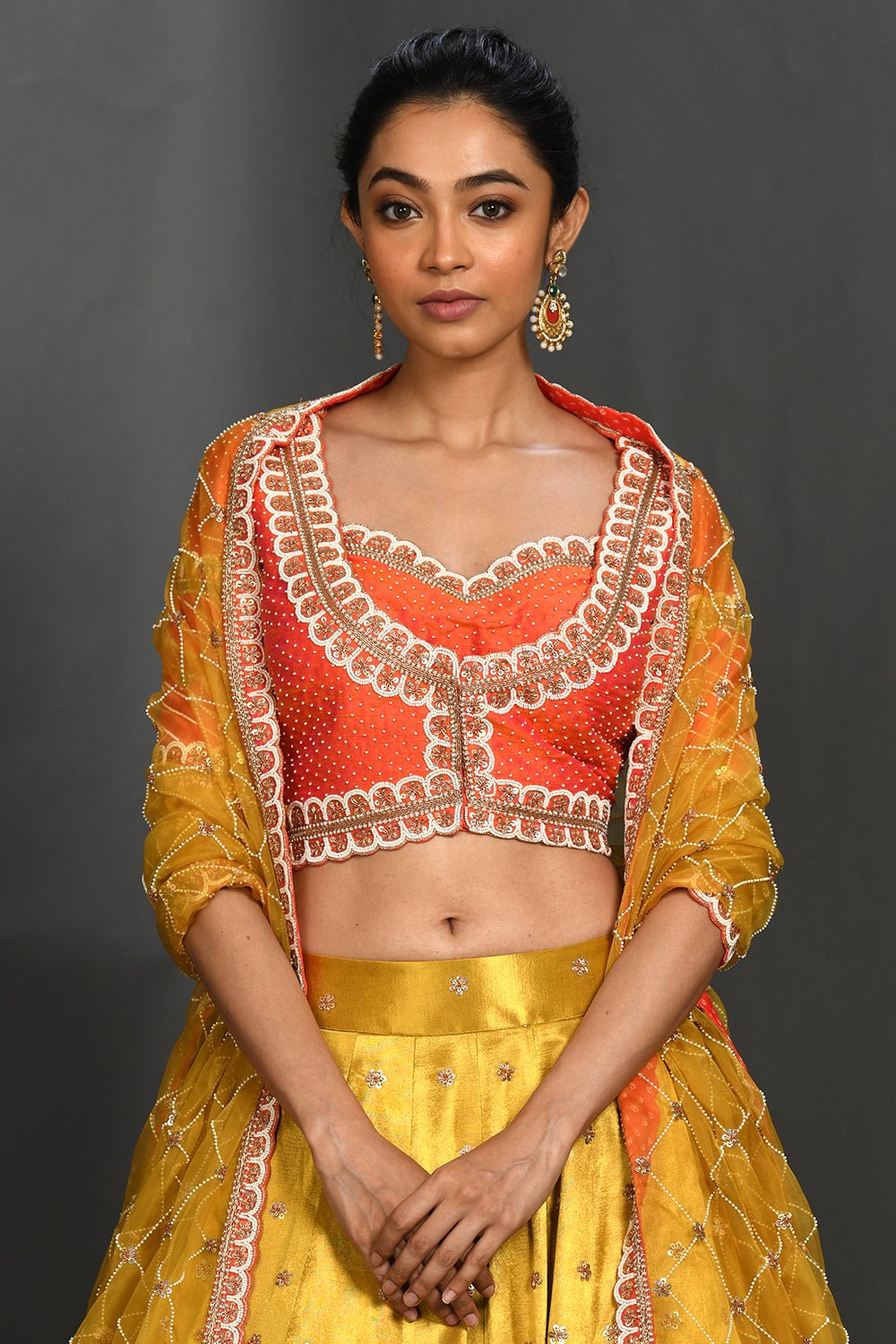 Shop gorgeous yellow embroidered cotton lehenga online in USA with coral choli. Make a fashion statement on festive occasions and weddings with palazzo suits, sharara suits, partywear dresses, salwar suits from Pure Elegance Indian fashion store in USA.-choli