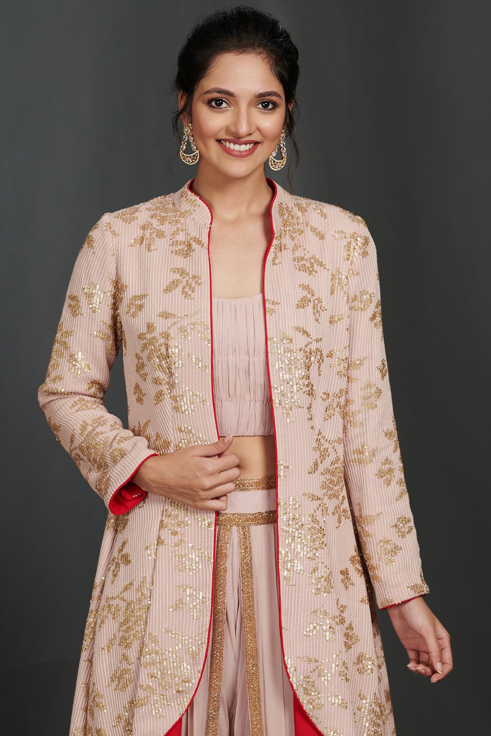 Shop stunning rose pink crop top and pant set online in USA with jacket. Make a fashion statement on festive occasions and weddings with palazzo suits, sharara suits, partywear dresses, salwar suits from Pure Elegance Indian fashion store in USA.-closeup