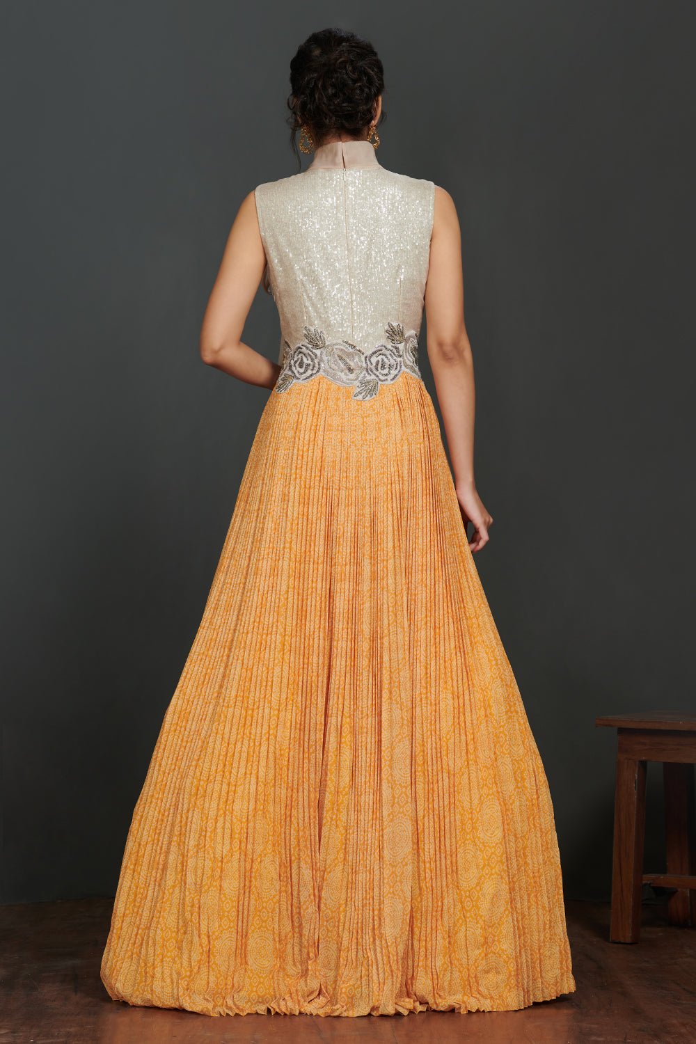 Shop beautiful silver and light orange pleated gown online in USA with scarf. Make a fashion statement on festive occasions and weddings with palazzo suits, sharara suits, partywear dresses, salwar suits from Pure Elegance Indian fashion store in USA.-back