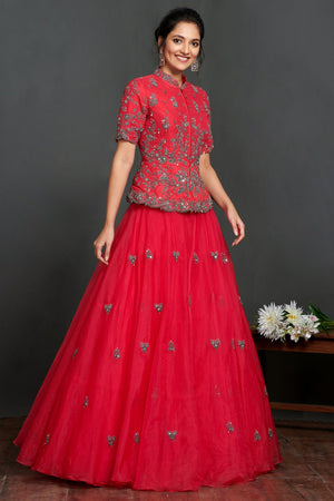 Buy stunning fushchia pink embroidered organza skirt online in USA with peplum blouse. Make a fashion statement on festive occasions and weddings with palazzo suits, sharara suits, partywear dresses, salwar suits from Pure Elegance Indian fashion store in USA.-side