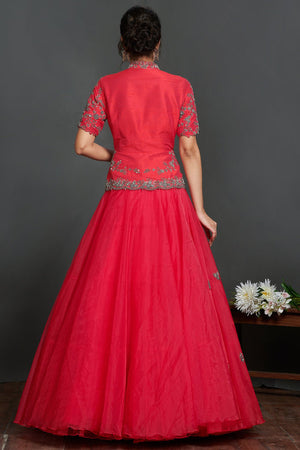 Buy stunning fushchia pink embroidered organza skirt online in USA with peplum blouse. Make a fashion statement on festive occasions and weddings with palazzo suits, sharara suits, partywear dresses, salwar suits from Pure Elegance Indian fashion store in USA.-back