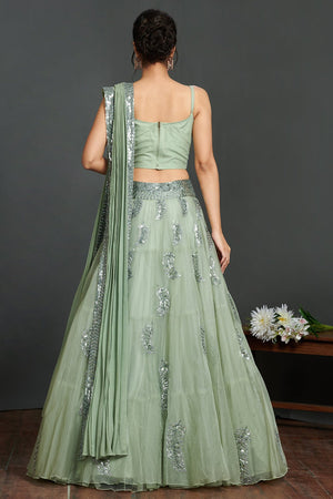 Shop gorgeous sage green organza lehenga online in USA with crop blouse and dupatta. Make a fashion statement on festive occasions and weddings with designer suits, Indian dresses, Anarkali suits, palazzo suits, designer gowns, sharara suits from Pure Elegance Indian fashion store in USA.-back