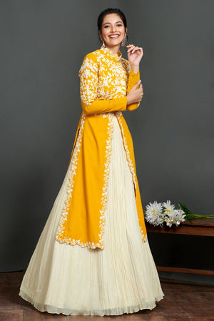Shop stunning yellow and cream embroidered kurta online in USA with lehenga. Make a fashion statement on festive occasions and weddings with palazzo suits, sharara suits, partywear dresses, salwar suits from Pure Elegance Indian fashion store in USA.-right