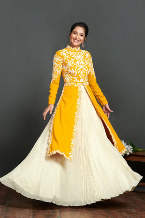 Shop stunning yellow and cream embroidered kurta online in USA with lehenga. Make a fashion statement on festive occasions and weddings with palazzo suits, sharara suits, partywear dresses, salwar suits from Pure Elegance Indian fashion store in USA.-front
