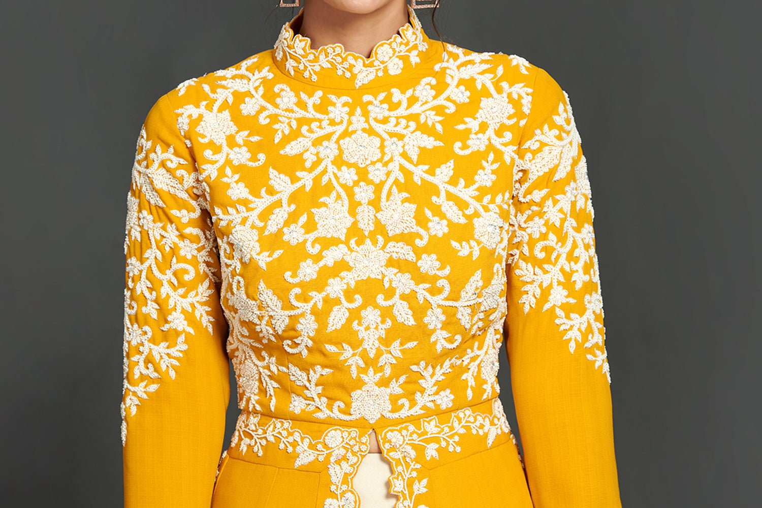Shop stunning yellow and cream embroidered kurta online in USA with lehenga. Make a fashion statement on festive occasions and weddings with palazzo suits, sharara suits, partywear dresses, salwar suits from Pure Elegance Indian fashion store in USA.-closeup