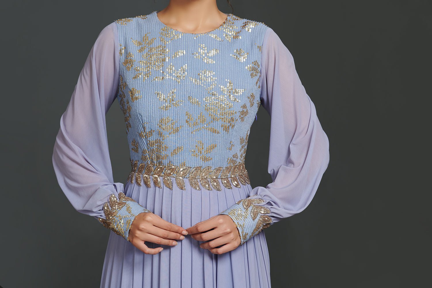 Buy stunning lavender balloon sleeves designer gown online in USA. Make a fashion statement on festive occasions and weddings with palazzo suits, sharara suits, partywear dresses, salwar suits, designer gowns from Pure Elegance Indian fashion store in USA.-front