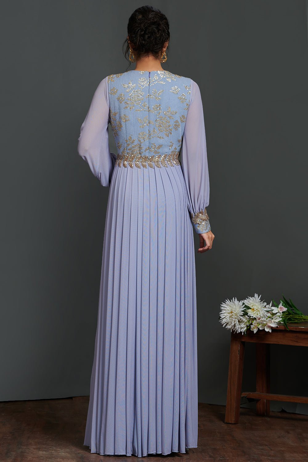 Buy stunning lavender balloon sleeves designer gown online in USA. Make a fashion statement on festive occasions and weddings with palazzo suits, sharara suits, partywear dresses, salwar suits, designer gowns from Pure Elegance Indian fashion store in USA.-back
