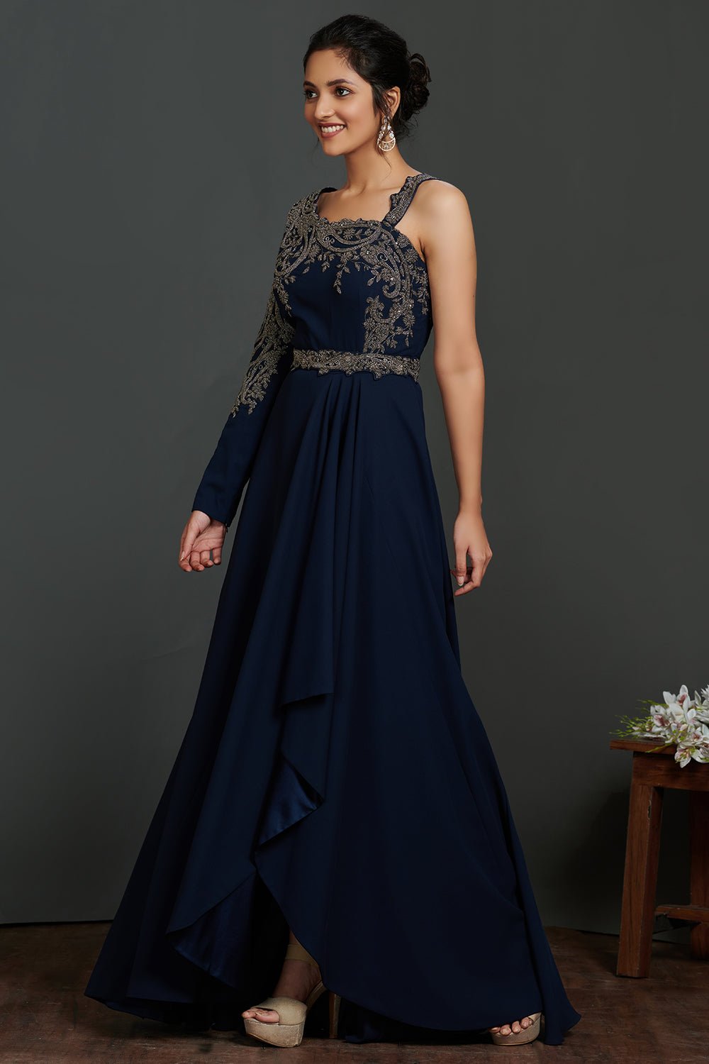 Buy beautiful navy blue antique golden embroidery asymmetric gown online in USA. Make a fashion statement on festive occasions and weddings with palazzo suits, sharara suits, partywear dresses, salwar suits from Pure Elegance Indian fashion store in USA.-side