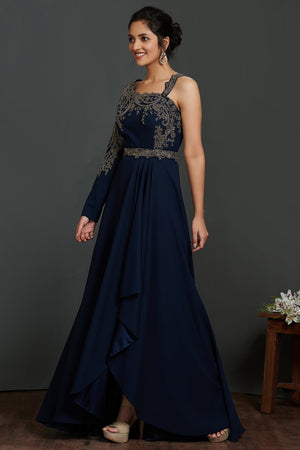 Buy beautiful navy blue antique golden embroidery asymmetric gown online in USA. Make a fashion statement on festive occasions and weddings with palazzo suits, sharara suits, partywear dresses, salwar suits from Pure Elegance Indian fashion store in USA.-side