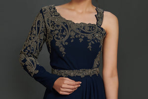Buy beautiful navy blue antique golden embroidery asymmetric gown online in USA. Make a fashion statement on festive occasions and weddings with palazzo suits, sharara suits, partywear dresses, salwar suits from Pure Elegance Indian fashion store in USA.-embroidery