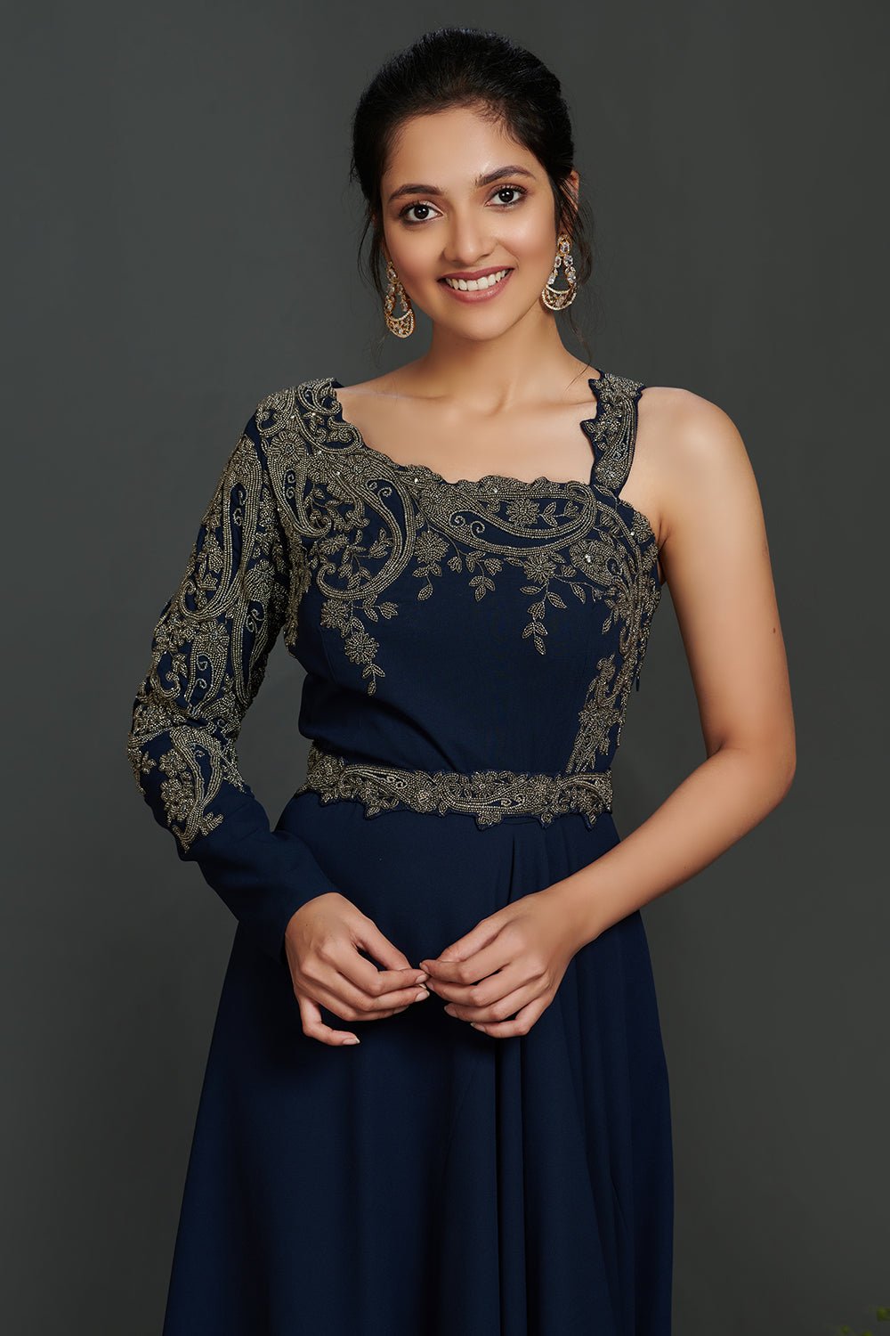 Buy beautiful navy blue antique golden embroidery asymmetric gown online in USA. Make a fashion statement on festive occasions and weddings with palazzo suits, sharara suits, partywear dresses, salwar suits from Pure Elegance Indian fashion store in USA.-closeup