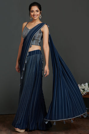 Buy beautiful cobalt blue pant saree online in USA with 3D embellished saree blouse. Make a fashion statement on festive occasions and weddings with designer suits, Indian dresses, Anarkali suits, palazzo suits, designer gowns, sharara suits from Pure Elegance Indian fashion store in USA.-pallu