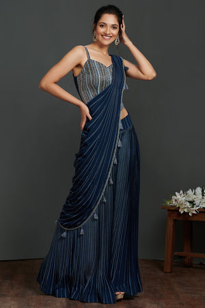 Buy beautiful cobalt blue pant saree online in USA with 3D embellished saree blouse. Make a fashion statement on festive occasions and weddings with designer suits, Indian dresses, Anarkali suits, palazzo suits, designer gowns, sharara suits from Pure Elegance Indian fashion store in USA.-front