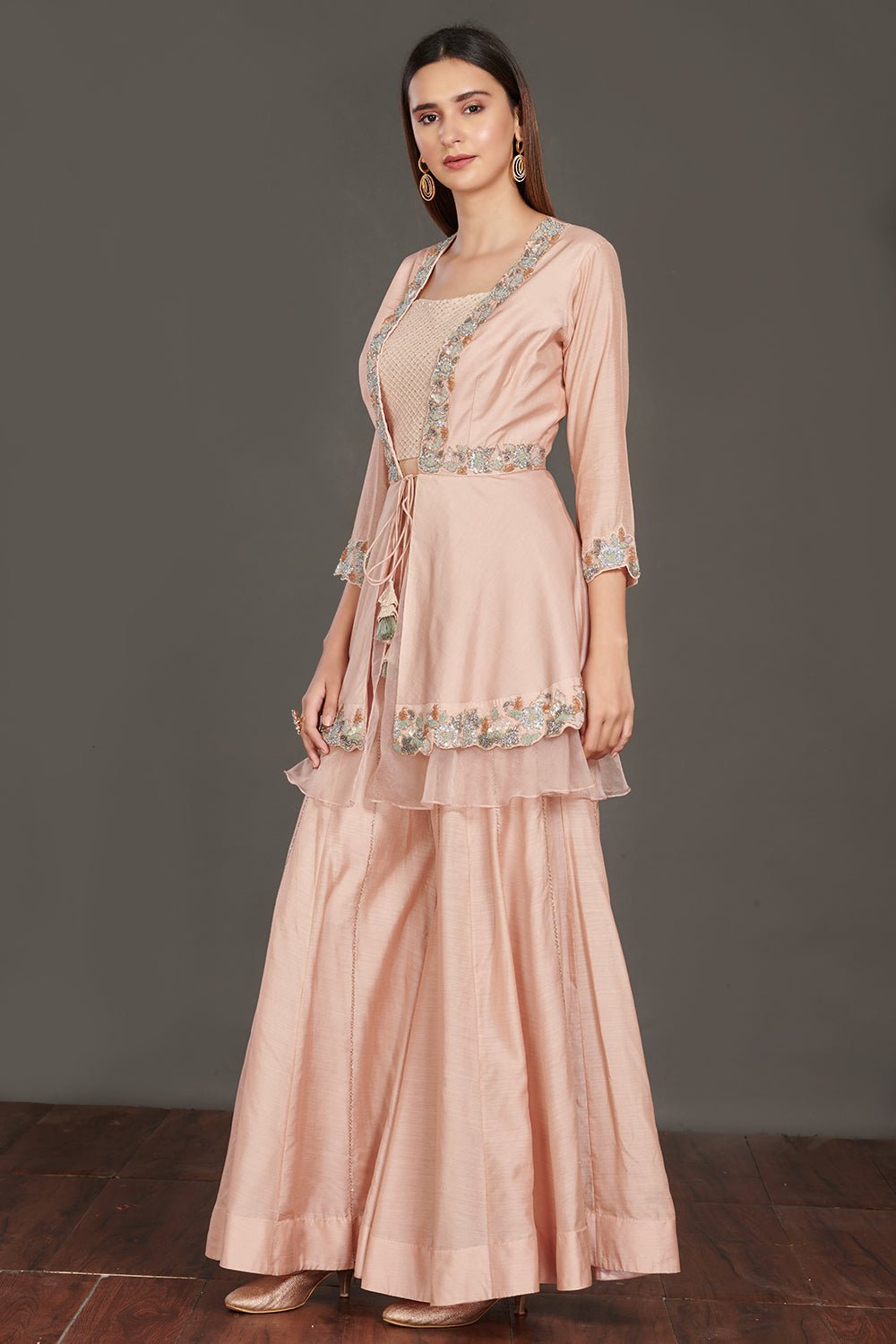 Shop beautiful light pink embroidered peplum jacket online in USA with flared palazzo. Make a fashion statement on festive occasions and weddings with palazzo suits, sharara suits, partywear dresses, salwar suits from Pure Elegance Indian fashion store in USA.-right