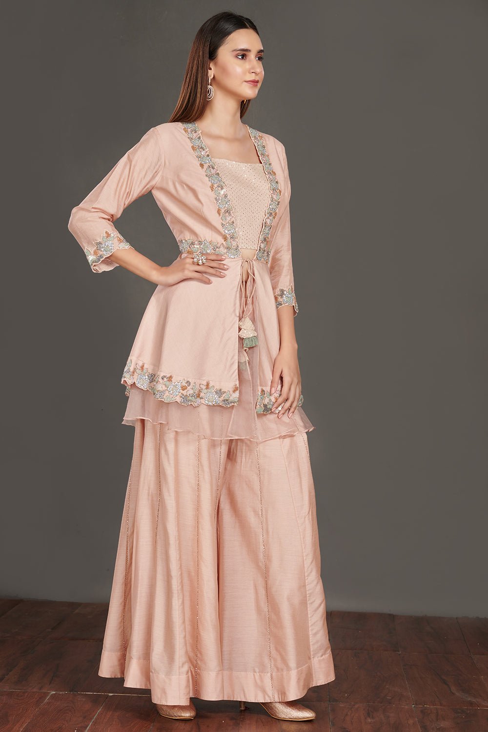 Shop beautiful light pink embroidered peplum jacket online in USA with flared palazzo. Make a fashion statement on festive occasions and weddings with palazzo suits, sharara suits, partywear dresses, salwar suits from Pure Elegance Indian fashion store in USA.-right